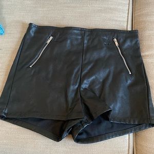 H&M Divided black pleather shorts.
